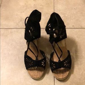 Black suede shoe with slight wedge